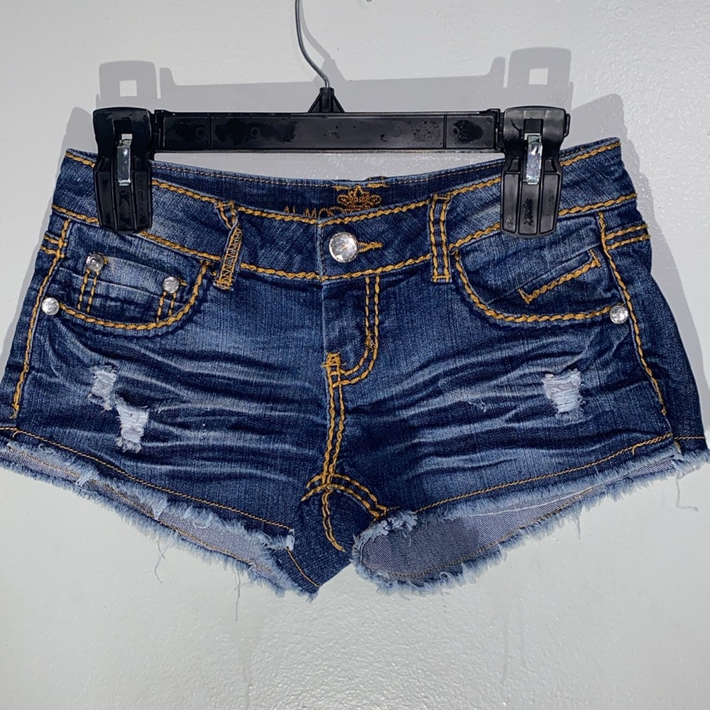 Almost Famous Denim Distressed Daisy Duke Shorts.